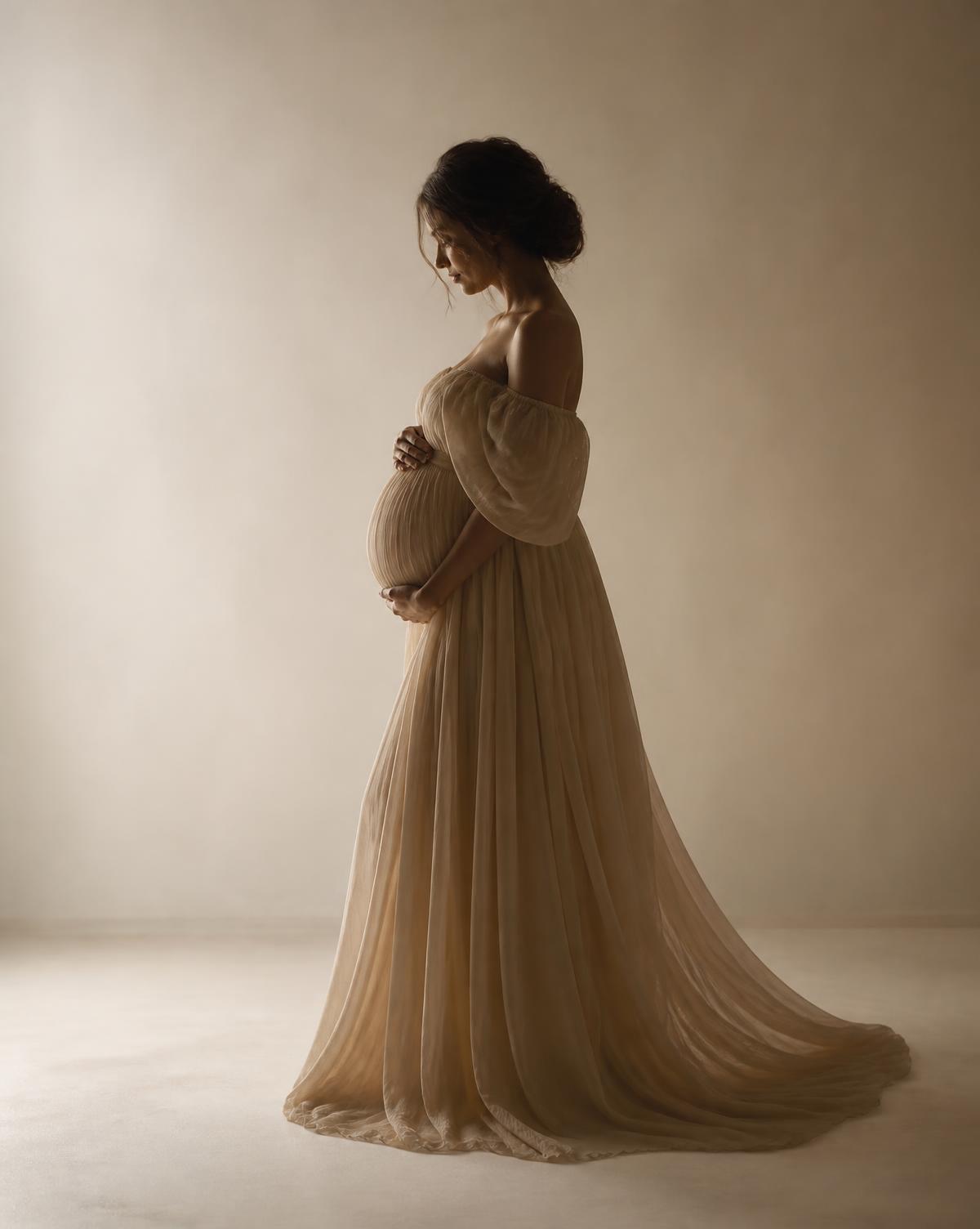 Maternity portrait in a flowing gown